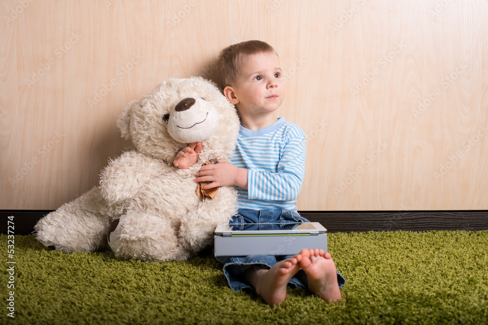 Boy and teddy bear with tablet computer, dreamy Boy and teddy bear with tablet computer, dreamy