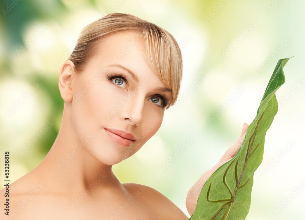 Fototapeta premium woman with green leaf