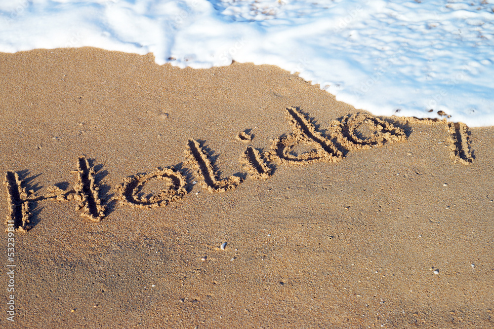 Fototapeta premium Beach and the word holiday