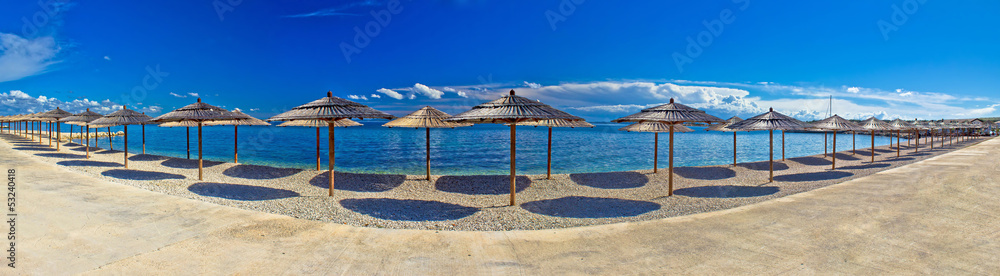 Fototapeta premium Beach umbrellas panoramic view, Vir island