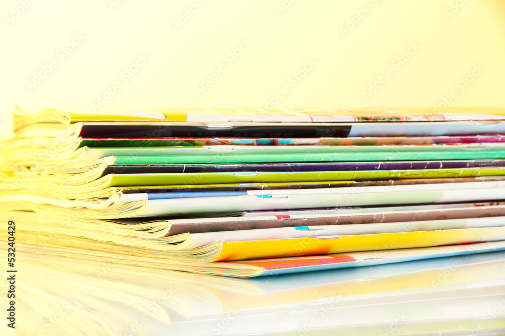 Many magazines on light background Many magazines on light background