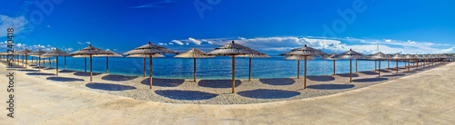 Fototapeta Naklejka Na Ścianę i Meble -  Beach umbrellas panoramic view, Vir island