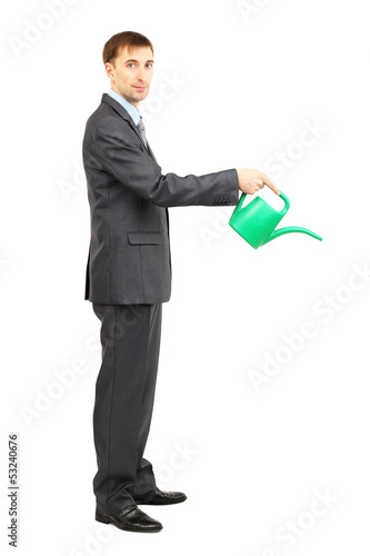 Young businessman pouring w...