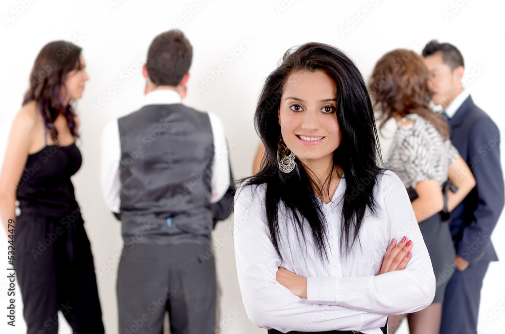 Portrait of businesswoman, team in background Portrait of businesswoman, team in background