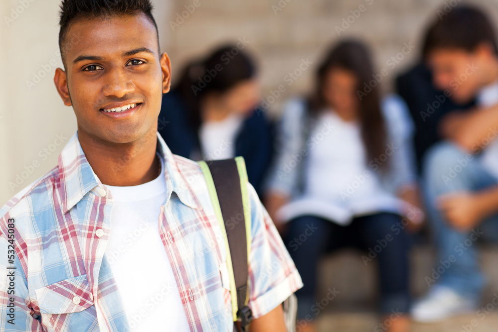 Fototapeta premium indian teenage student carrying schoolbag