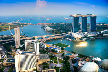 Fotobehang Singapore Singapore skyline tijdens zonsondergang  © Luciano Mortula-LGM