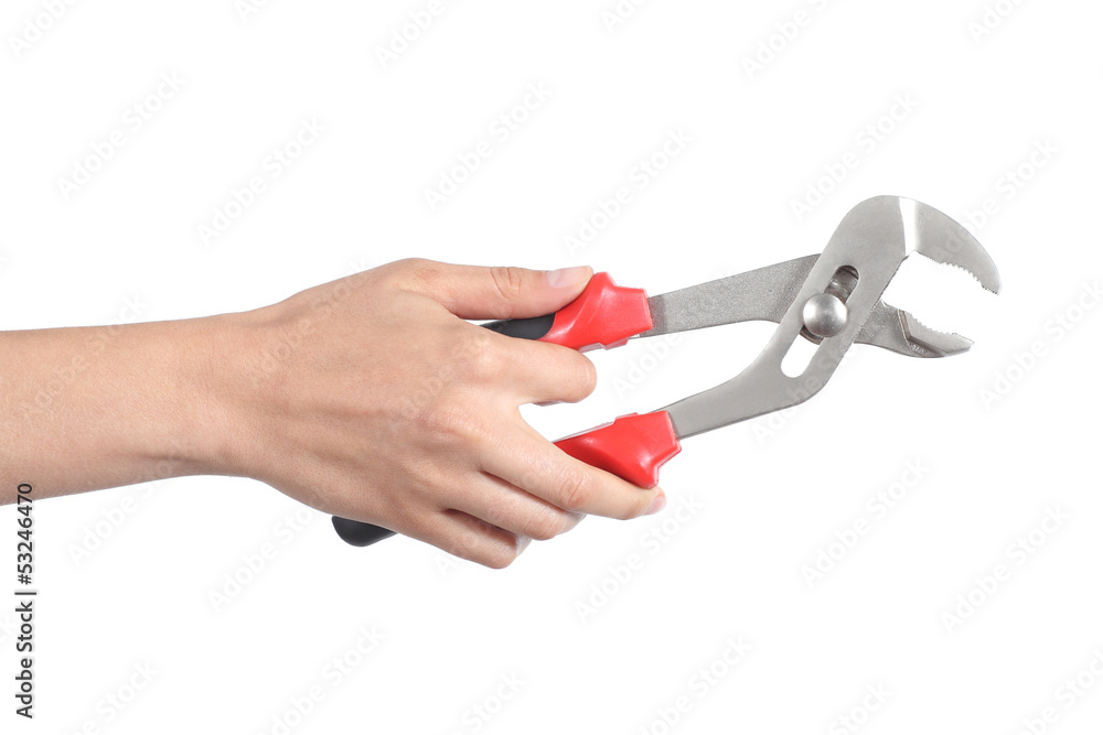 Woman hand using a water pump pliers opened Woman hand using a water pump pliers opened