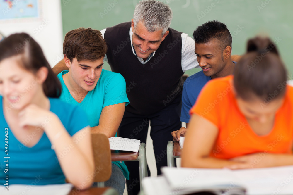 senior high school teacher helping students senior high school teacher helping students