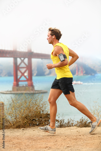 Fototapeta Naklejka Na Ścianę i Meble -  Man jogging - male running in San Francisco