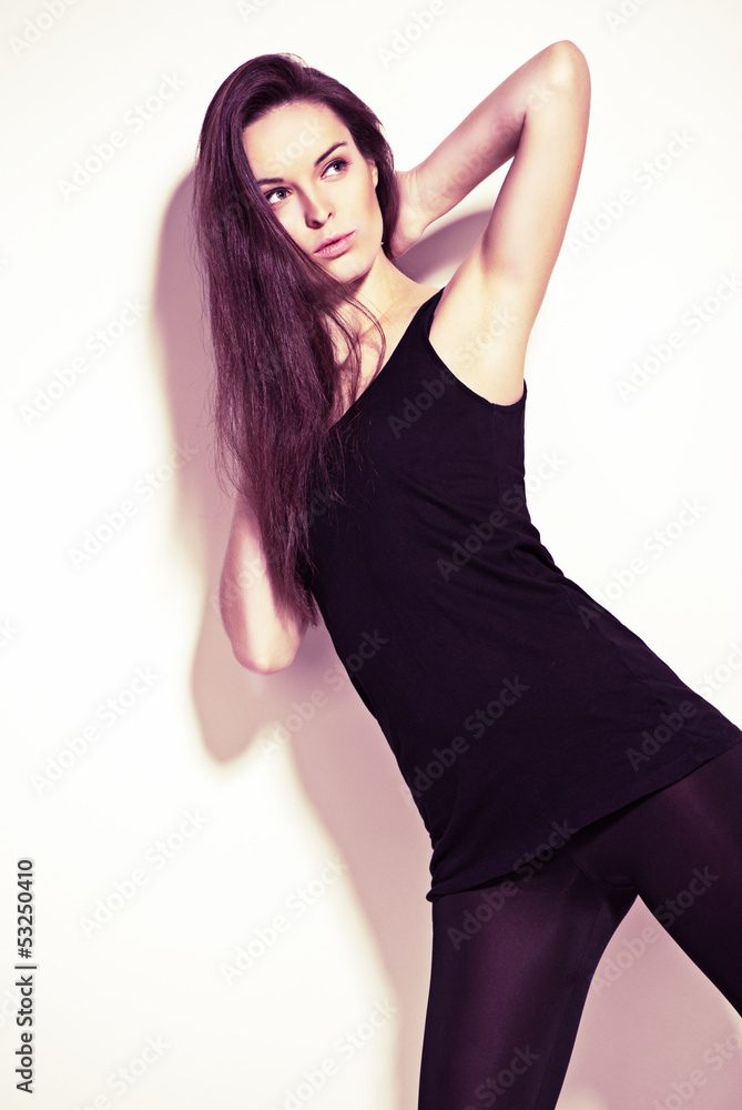 Beautiful posing woman on white background Beautiful posing woman on white background