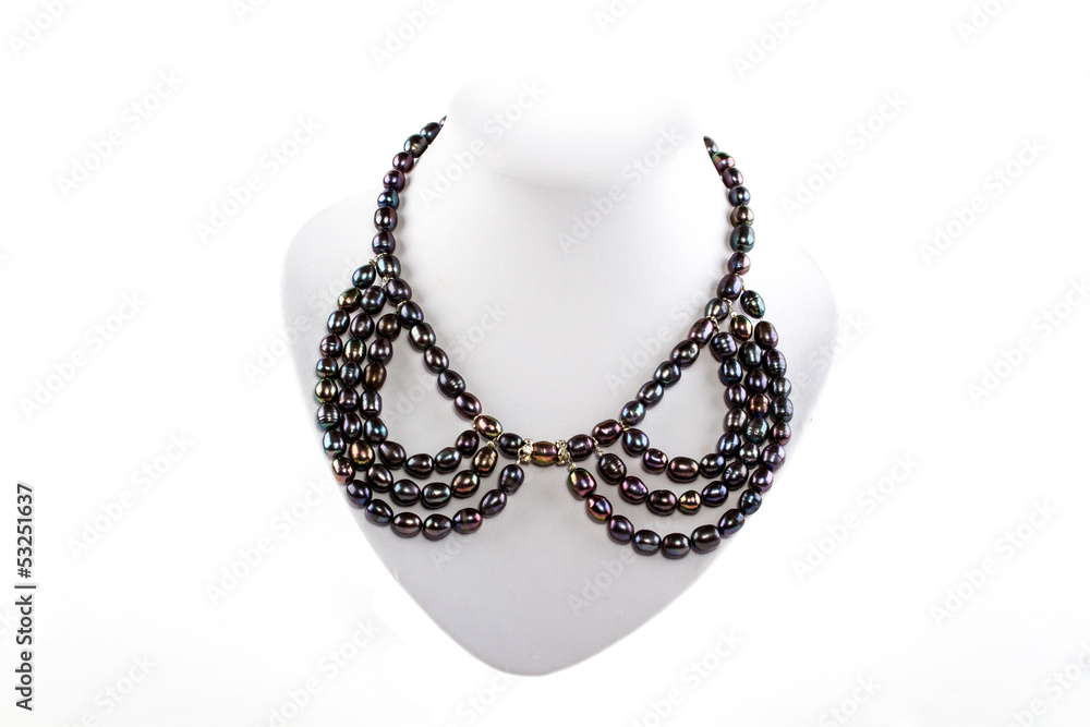 natural stone beads necklace on a stand natural stone beads necklace on a stand