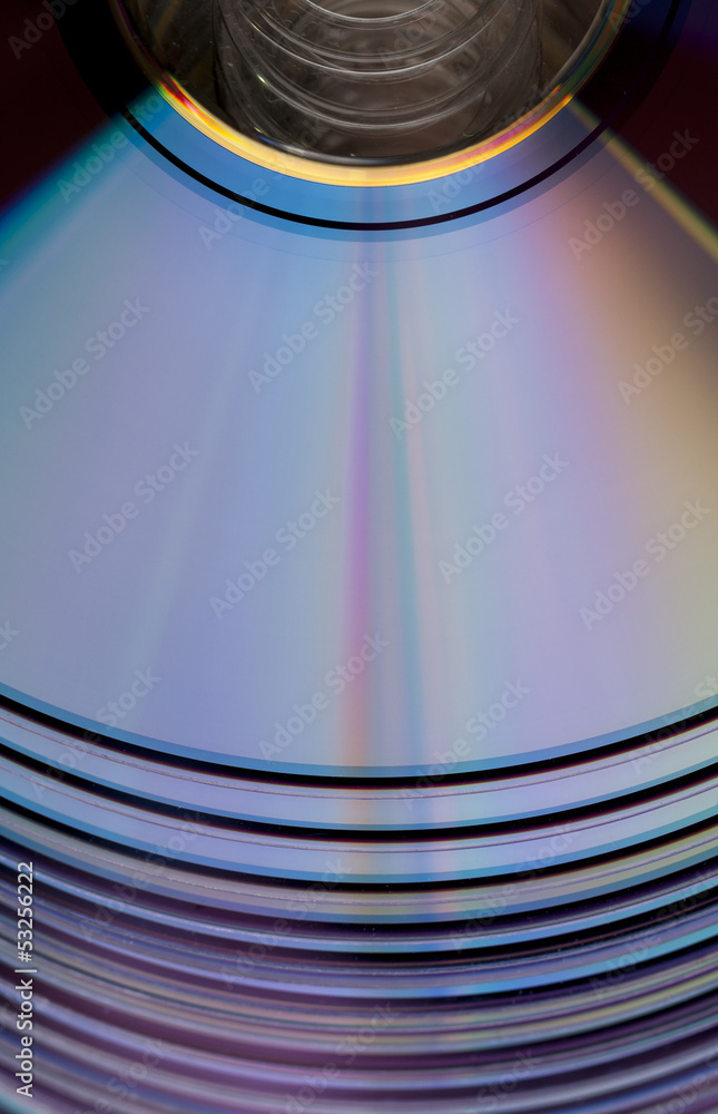Many CD or DVD disks on each other Many CD or DVD disks on each other