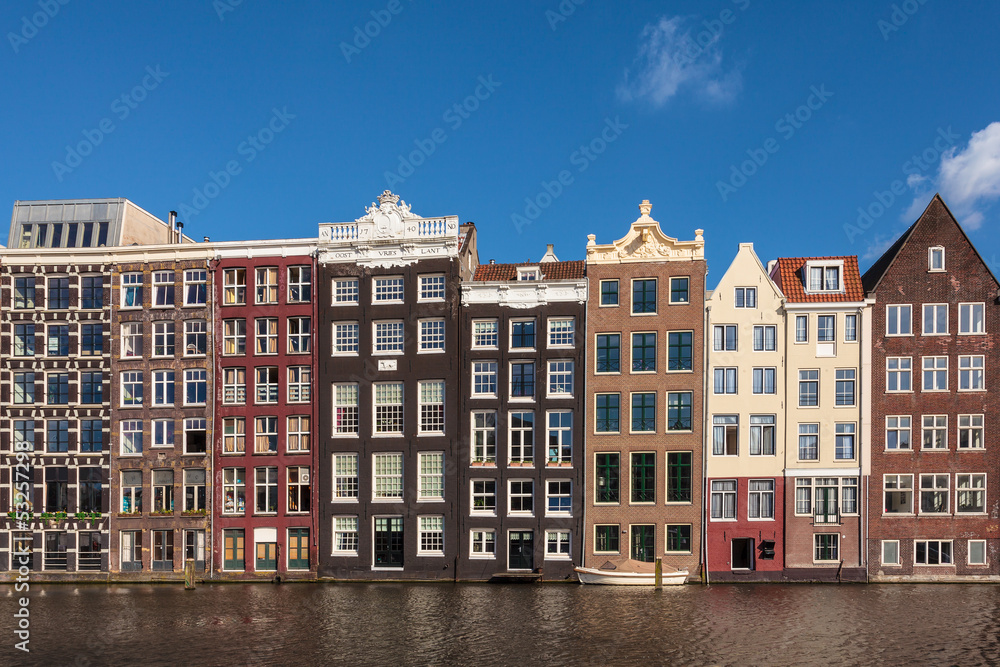 Ancient canal houses in the Dutch capital city Amsterdam