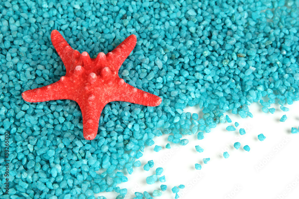 Starfish on blue crystals of sea salt background Starfish on blue crystals of sea salt background