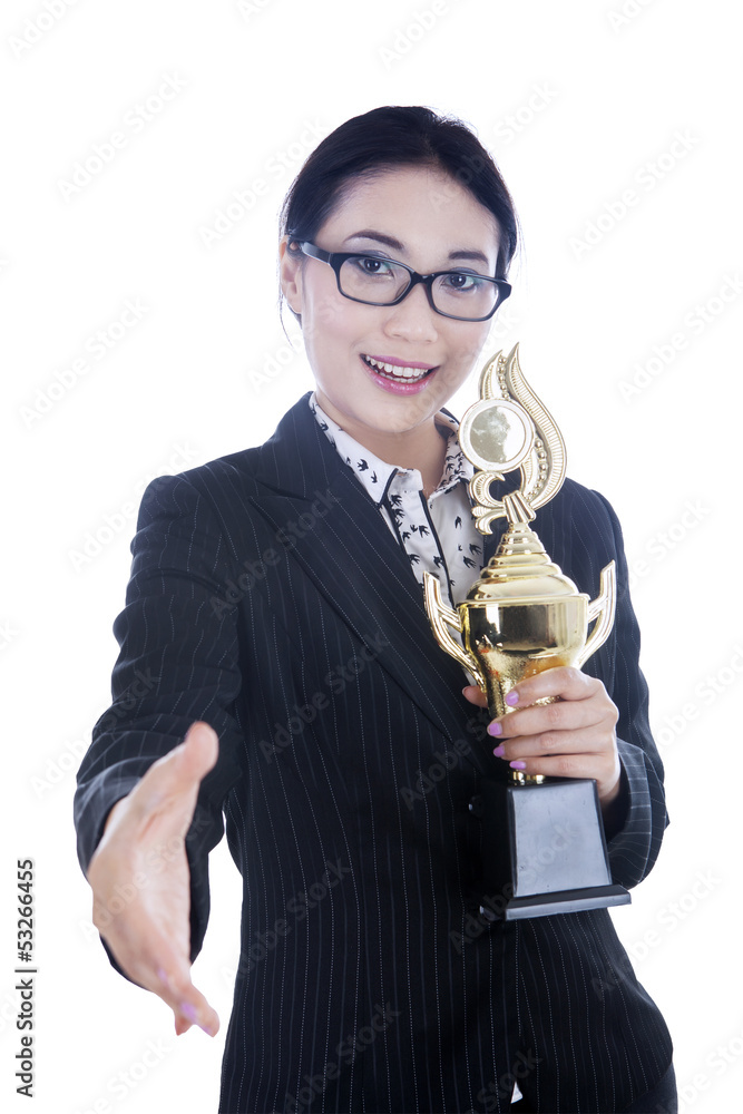 Businesswoman bring trophy and give handshake Businesswoman bring trophy and give handshake