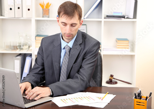 Young businessman in office...