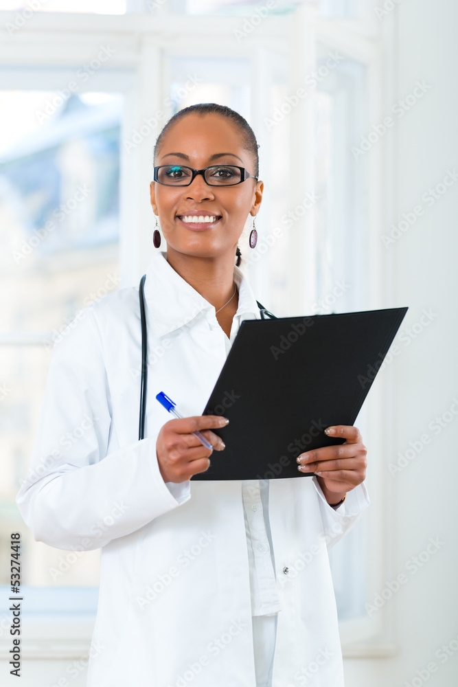 Portrait of young female doctor in clinic Portrait of young female doctor in clinic
