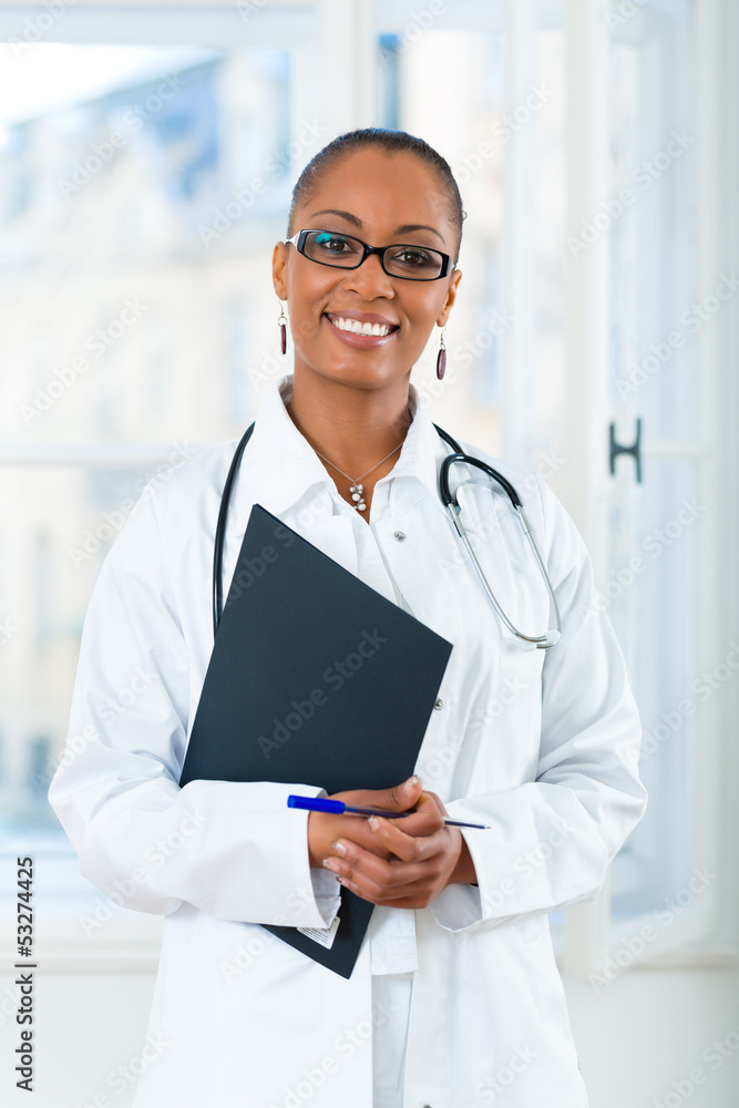 Portrait of young female doctor in clinic Portrait of young female doctor in clinic