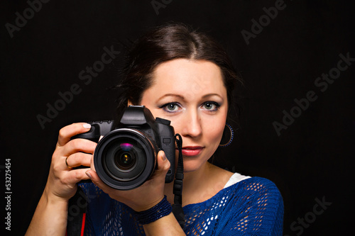 Young woman with camera © Alena Stalmashonak
