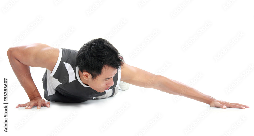 Young man doing push up exercise Young man doing push up exercise