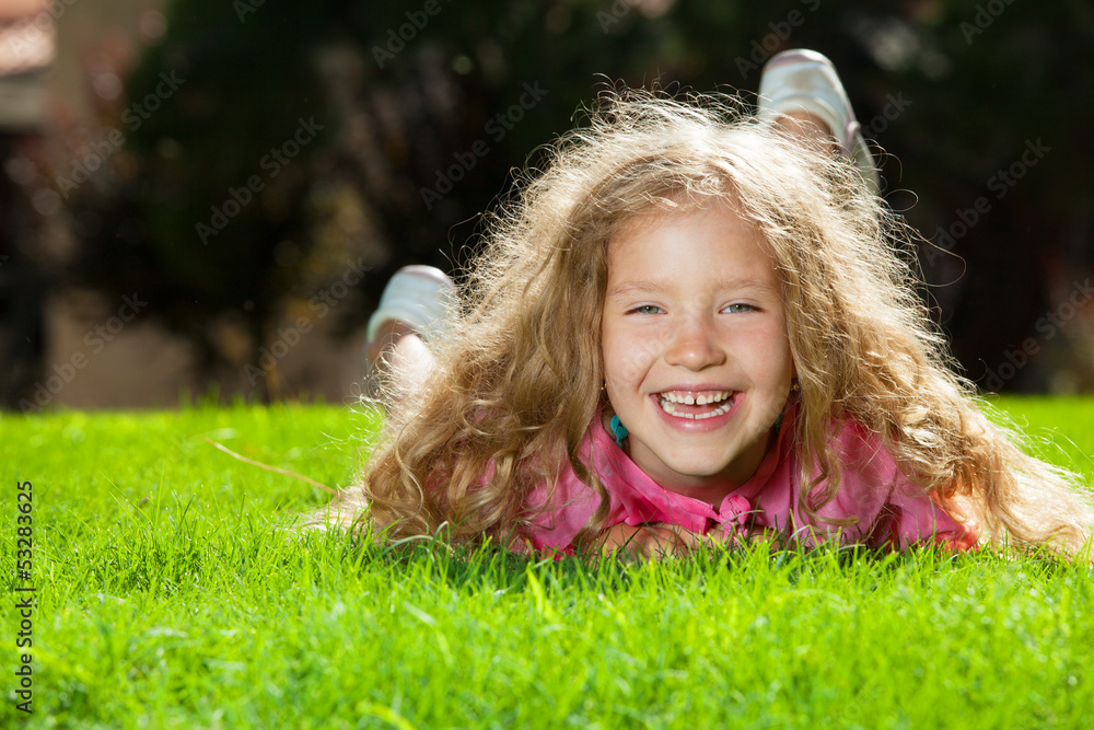 Laughing girl on grass Laughing girl on grass