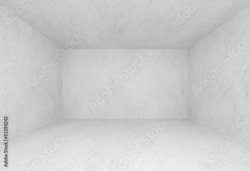 White interior of empty room with concrete walls