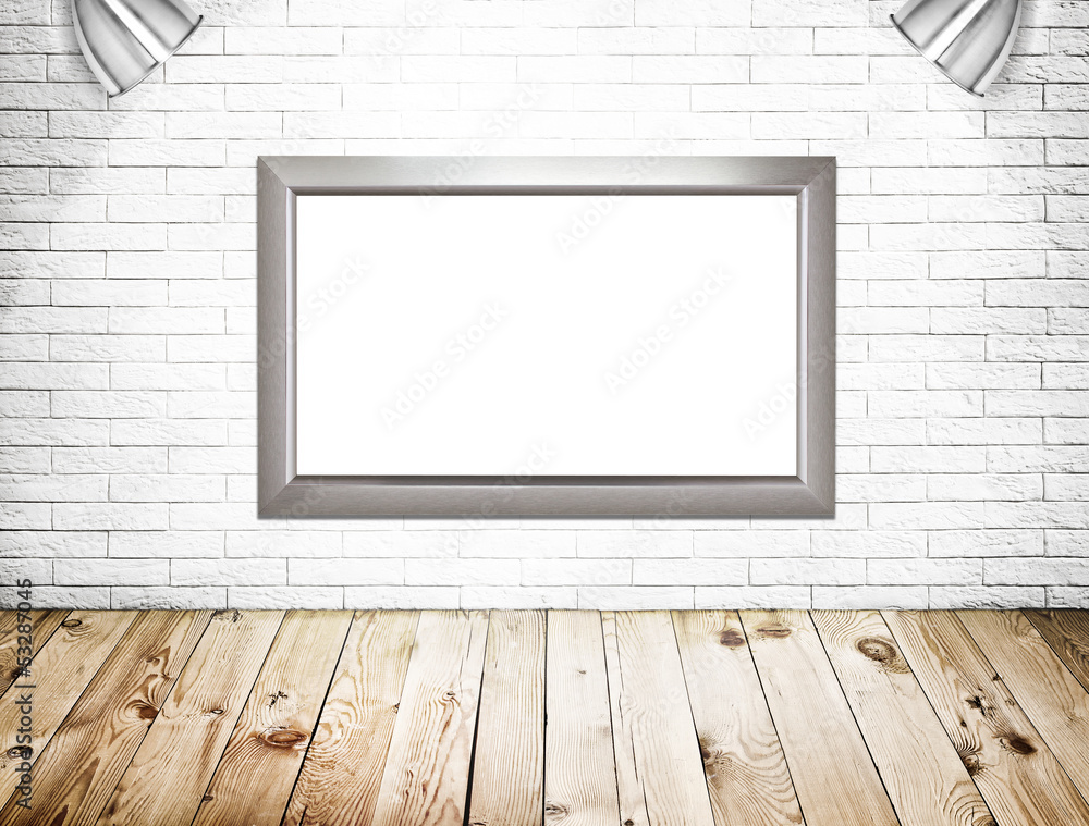 Room interior with blank frame on the wall Room interior with blank frame on the wall