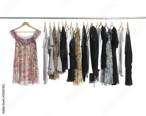 Variety of casual fashion clothing on hangers