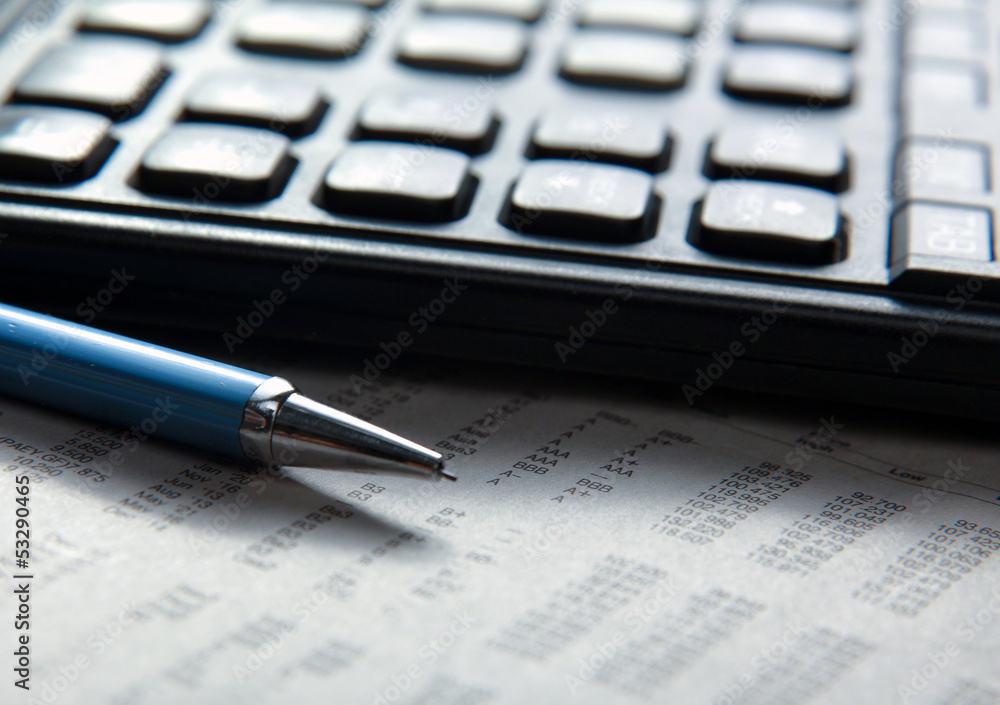 Calculator, pen and documents Calculator, pen and documents