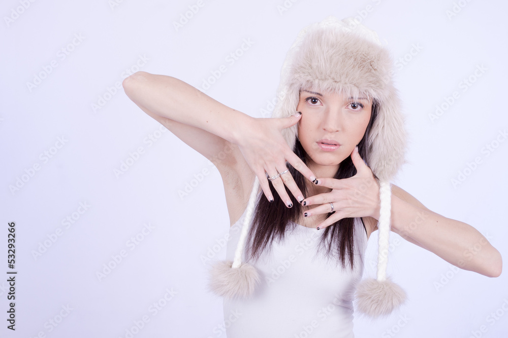Beautiful Girl in Furry Hat. Winter Woman Portrait