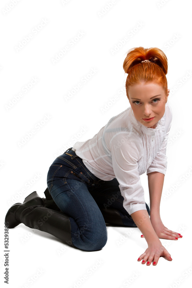 beautiful red-haired girl in a white beautiful red-haired girl in a white