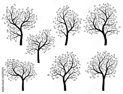 Abstract silhouettes of spring trees with leaves.