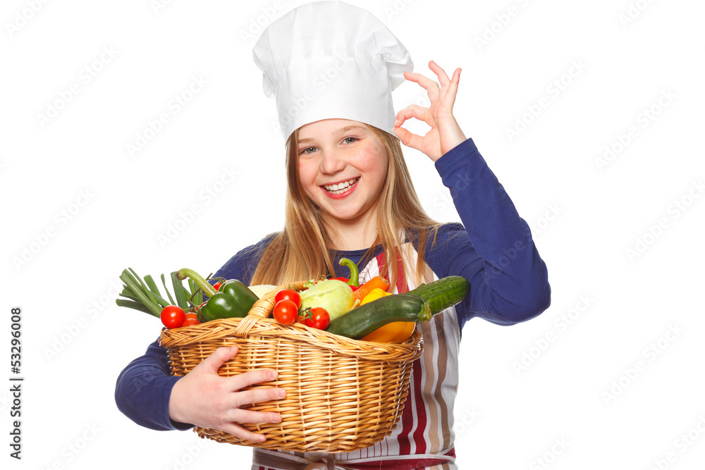 junior cook with vegetables smiling junior cook with vegetables smiling