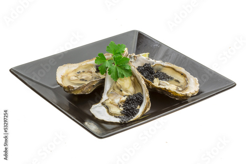 Oysters with black cavair photo