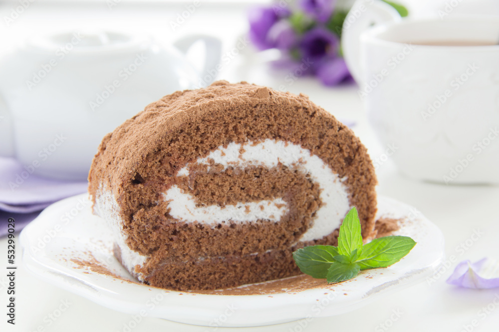 Chocolate roll with cream.
