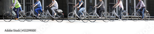 A large group of cyclists. Rent bikes.