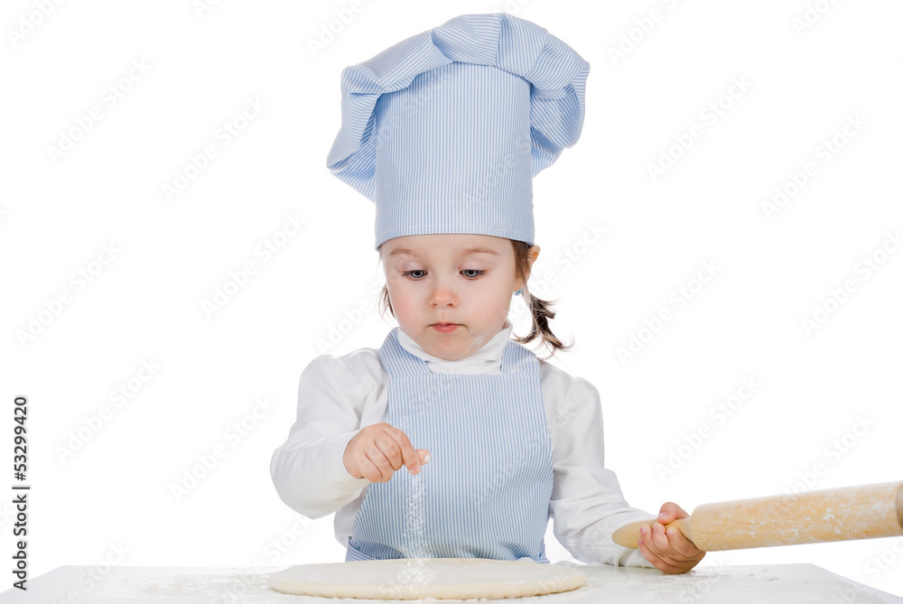 Beautiful little girl cooking and sprinkle with flour pizza Beautiful little girl cooking and sprinkle with flour pizza