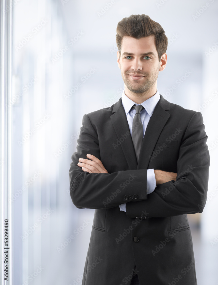 Business man smiling with arms crossed Business man smiling with arms crossed