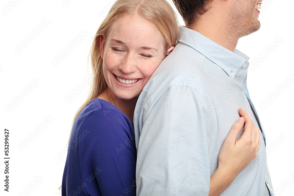 Young woman embracing her boyfriend Young woman embracing her boyfriend