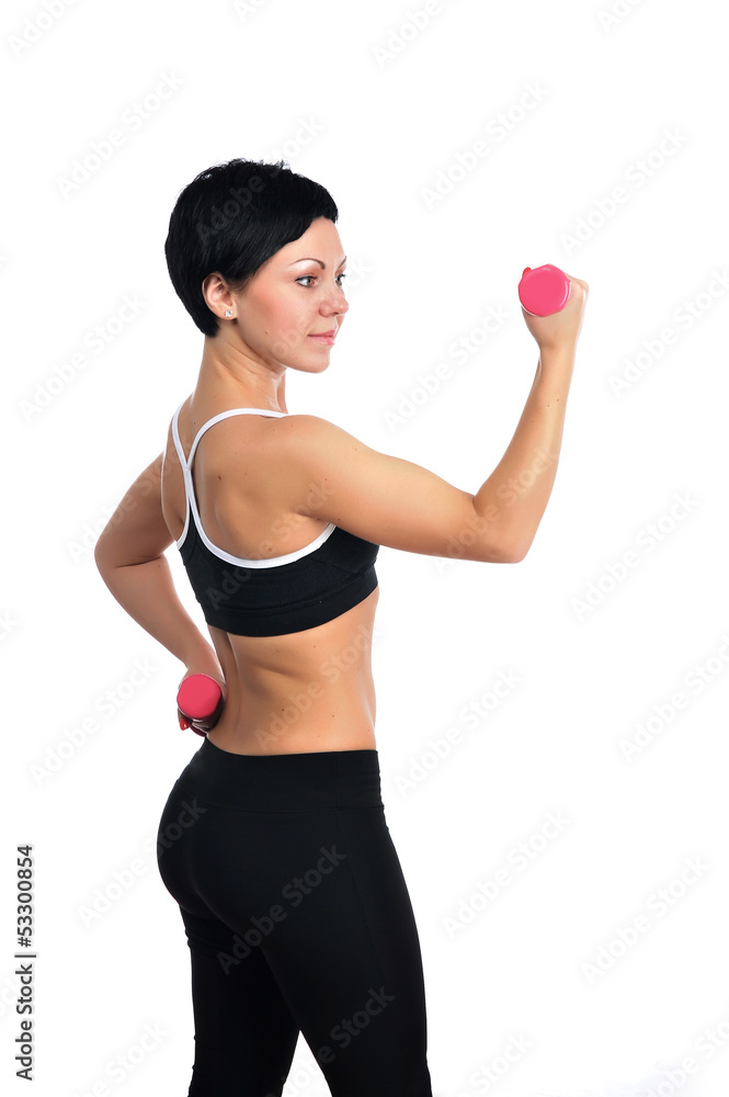 Portrait of young fitness woman with a dumbbells Portrait of young fitness woman with a dumbbells