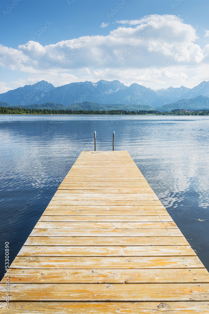 Fototapeta Jetty with lake and alps