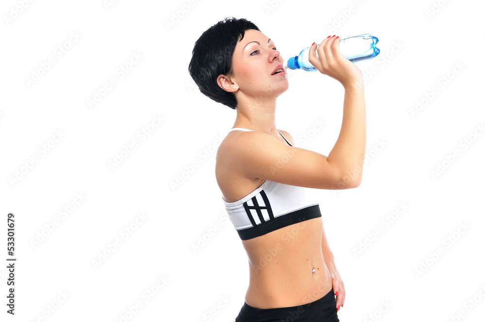 Young fitness woman with a bottle of water Young fitness woman with a bottle of water