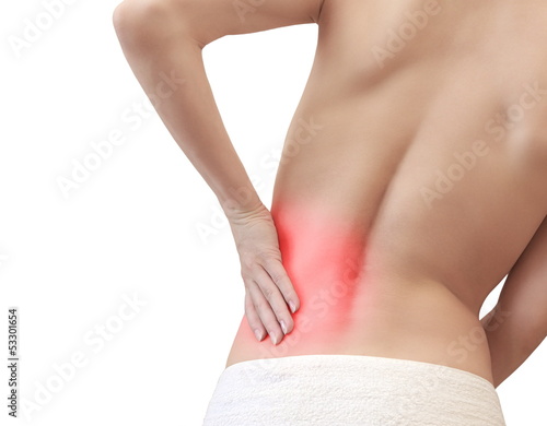 Young woman with back pain holding the hand isolated