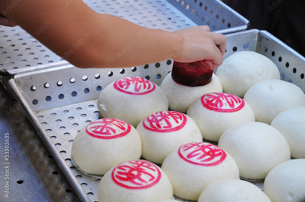 Naklejka premium Steamed buns at the annual Cheung Chau bun festival