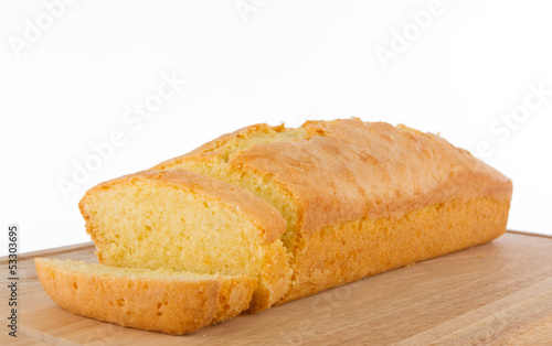 Fresh homemade butter cake on cutting board