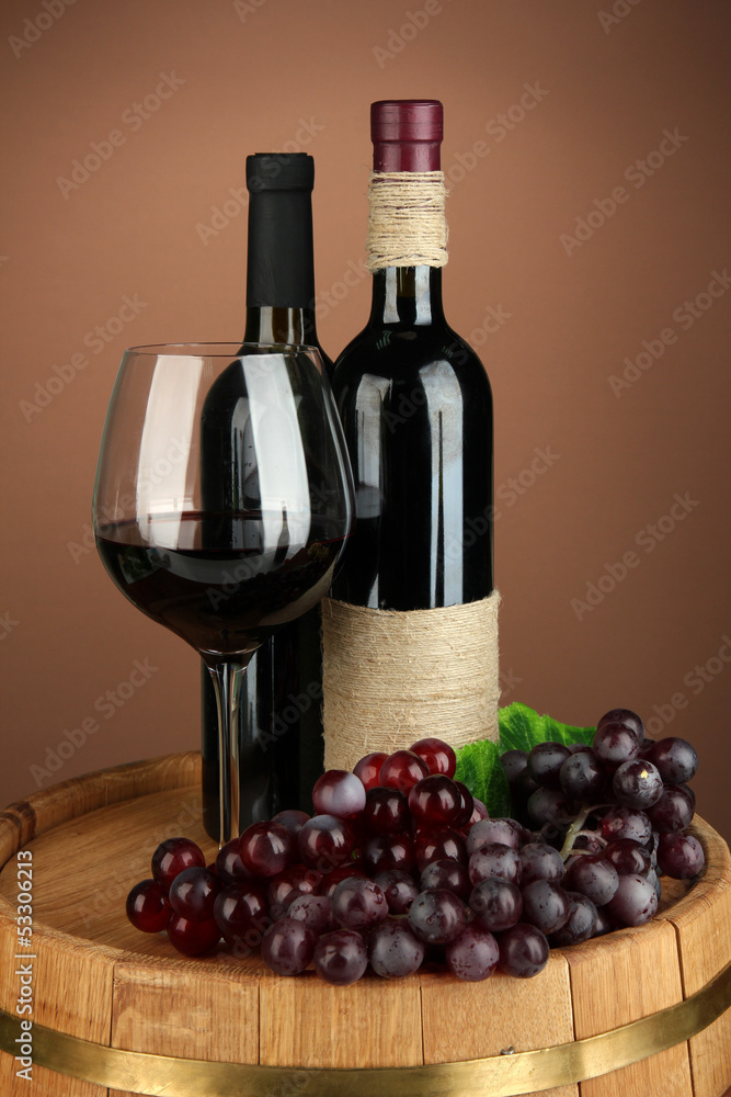 Composition of wine bottles, glass of red wine, grape