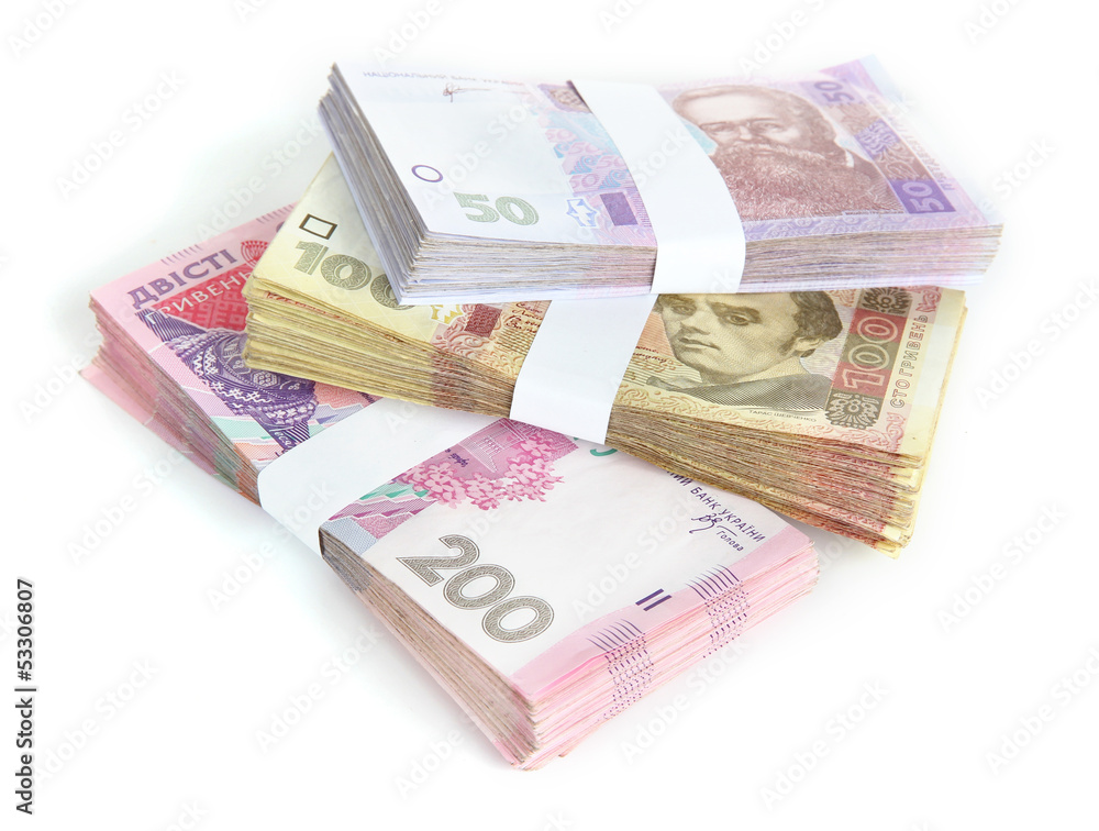 Pile of Ukrainian money, isolated on white Pile of Ukrainian money, isolated on white