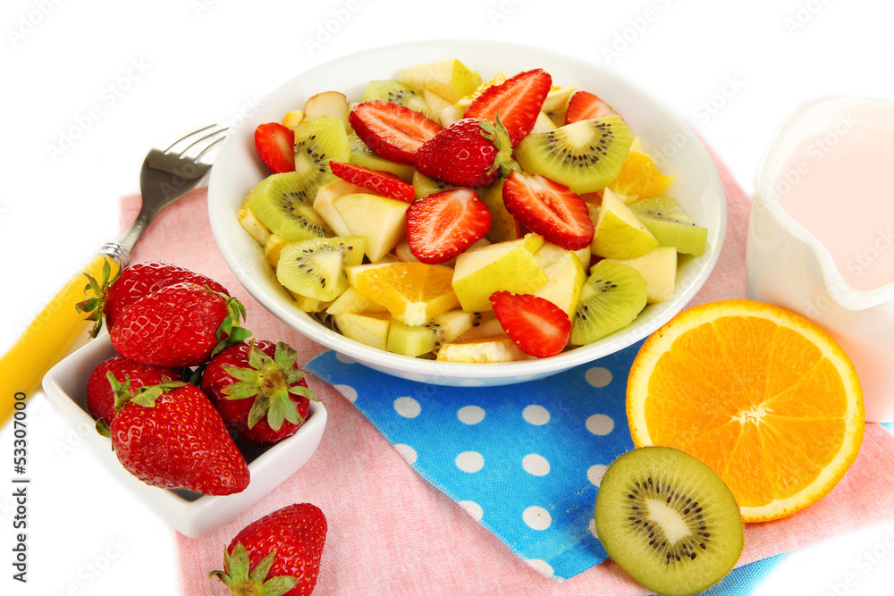 Useful fruit salad of fresh fruits and berries in bowl isolated Useful fruit salad of fresh fruits and berries in bowl isolated