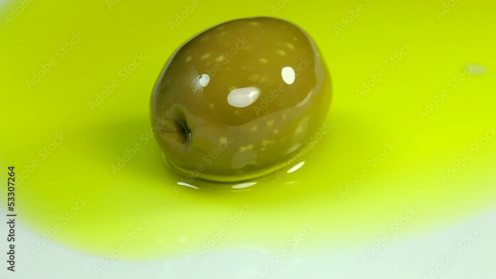 Olive and Extra virgin Olive oil on plate Olive and Extra virgin Olive oil on plate