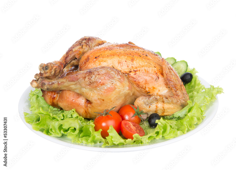 Garnished roasted thanksgiving chicken on a plate